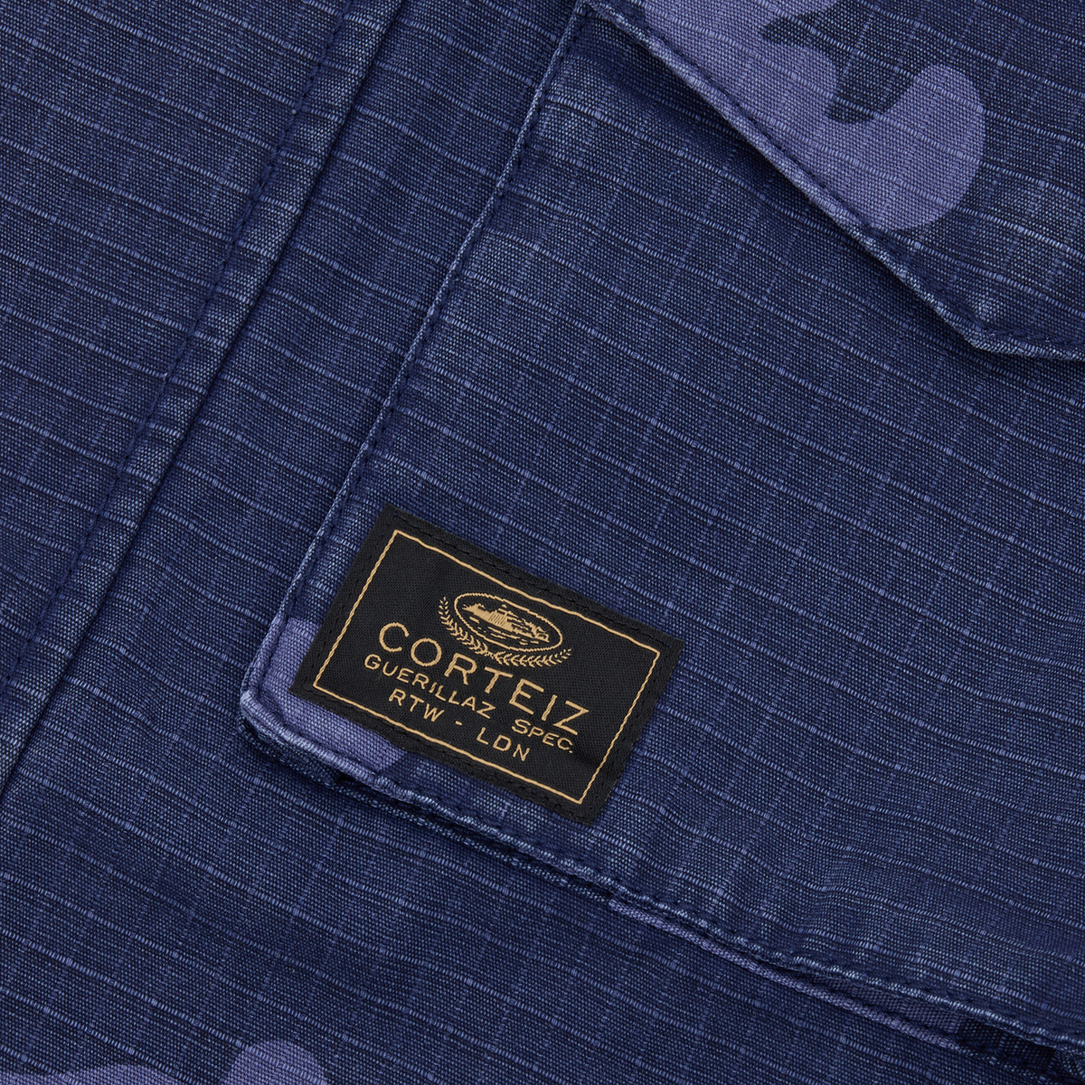 Corteiz Guerillaz Field Jacket - Indigo Camo